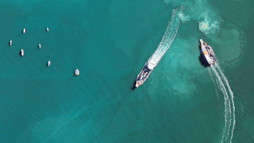 Two ferries navigating past each other